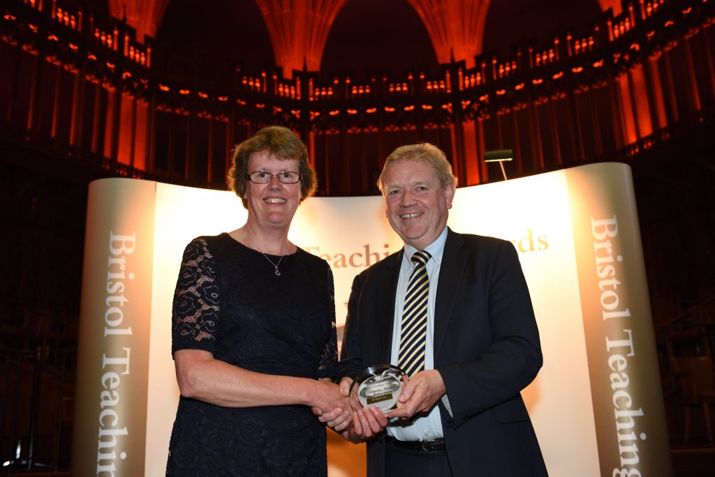 Dr Lesley Nolan receiving her award from Professor Jonathan Sandy